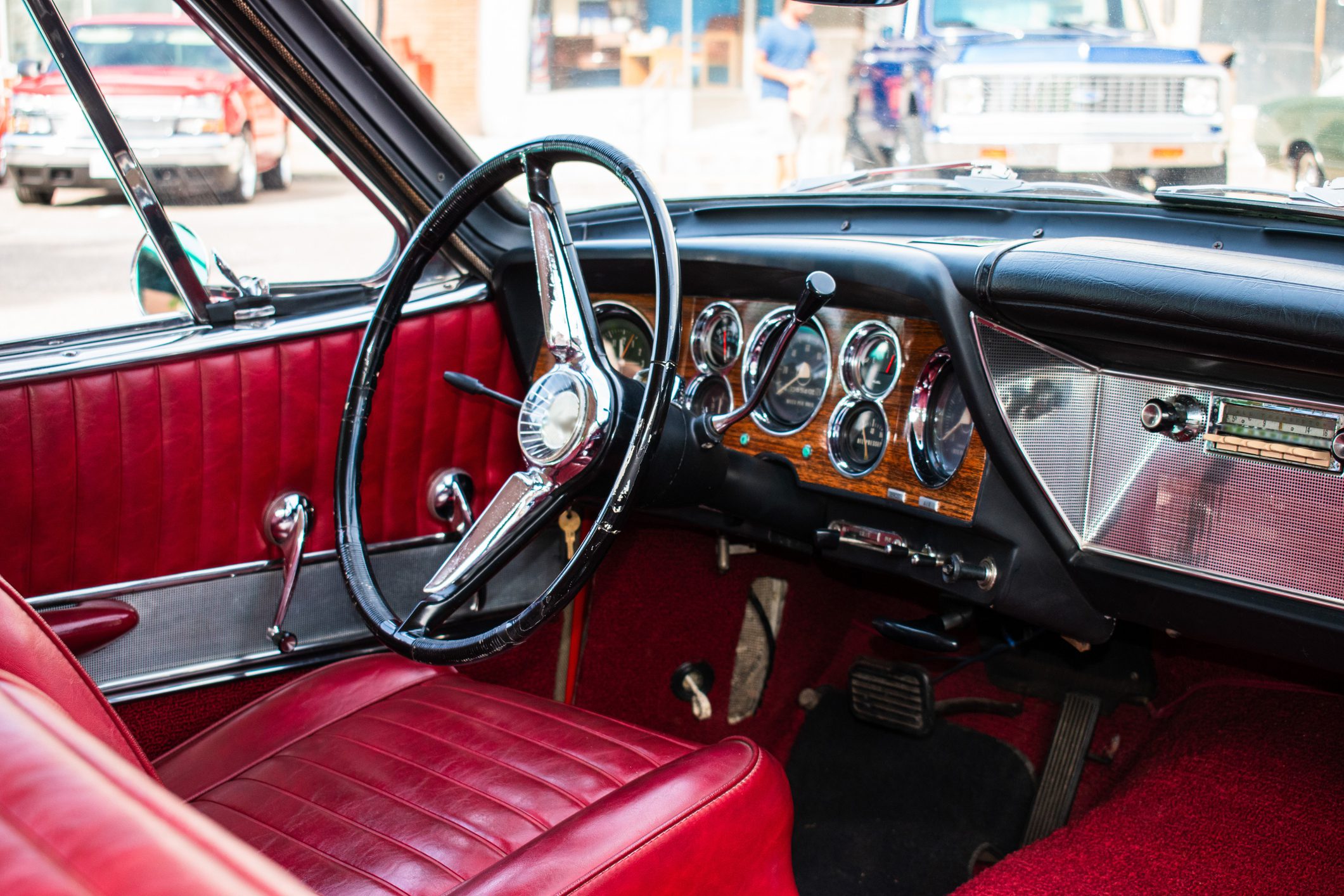 Interior view of a car with red seats